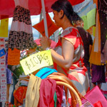 woman shopping for cloth bags in Little India 