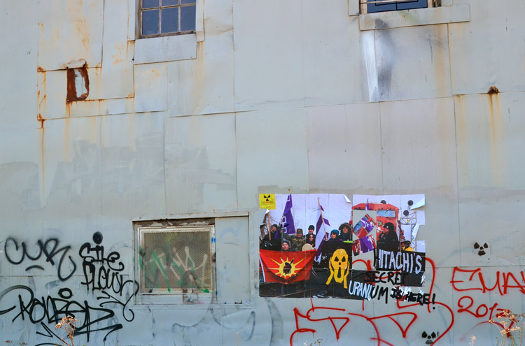 poster protesting the uranium found on the site of the old Hitachi plant in Toronto