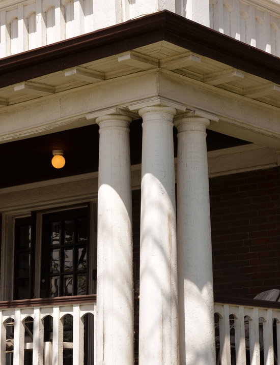 white pillars on a house porch
