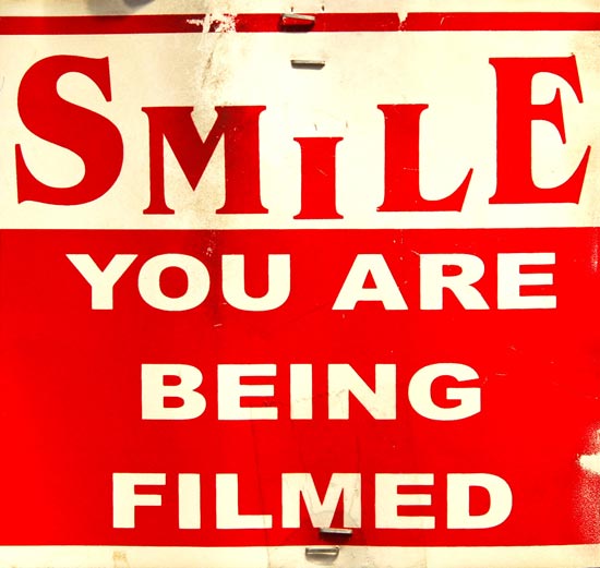 poster that warns you that you are being filmed