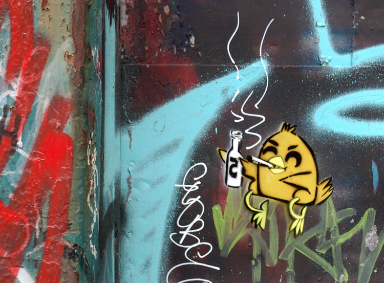 graffiti of a yellow bird smoking a cigarette