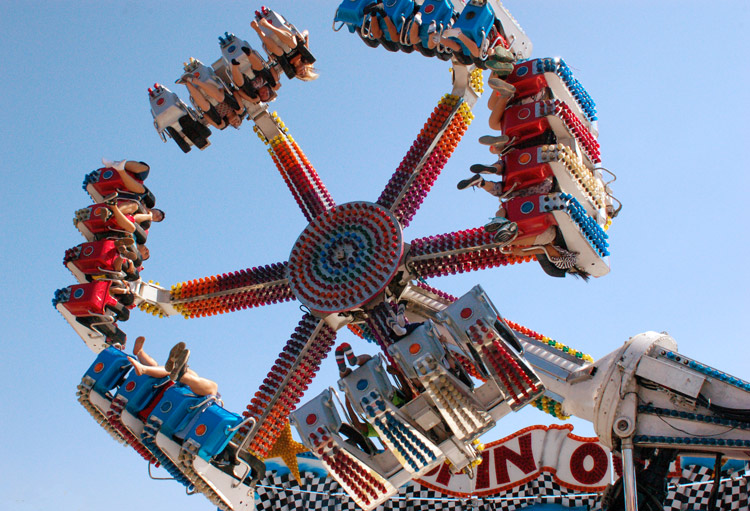 riders on a midway ride